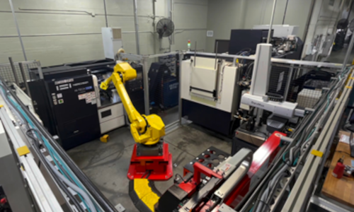 Robotic arm in a manufacturing setting.